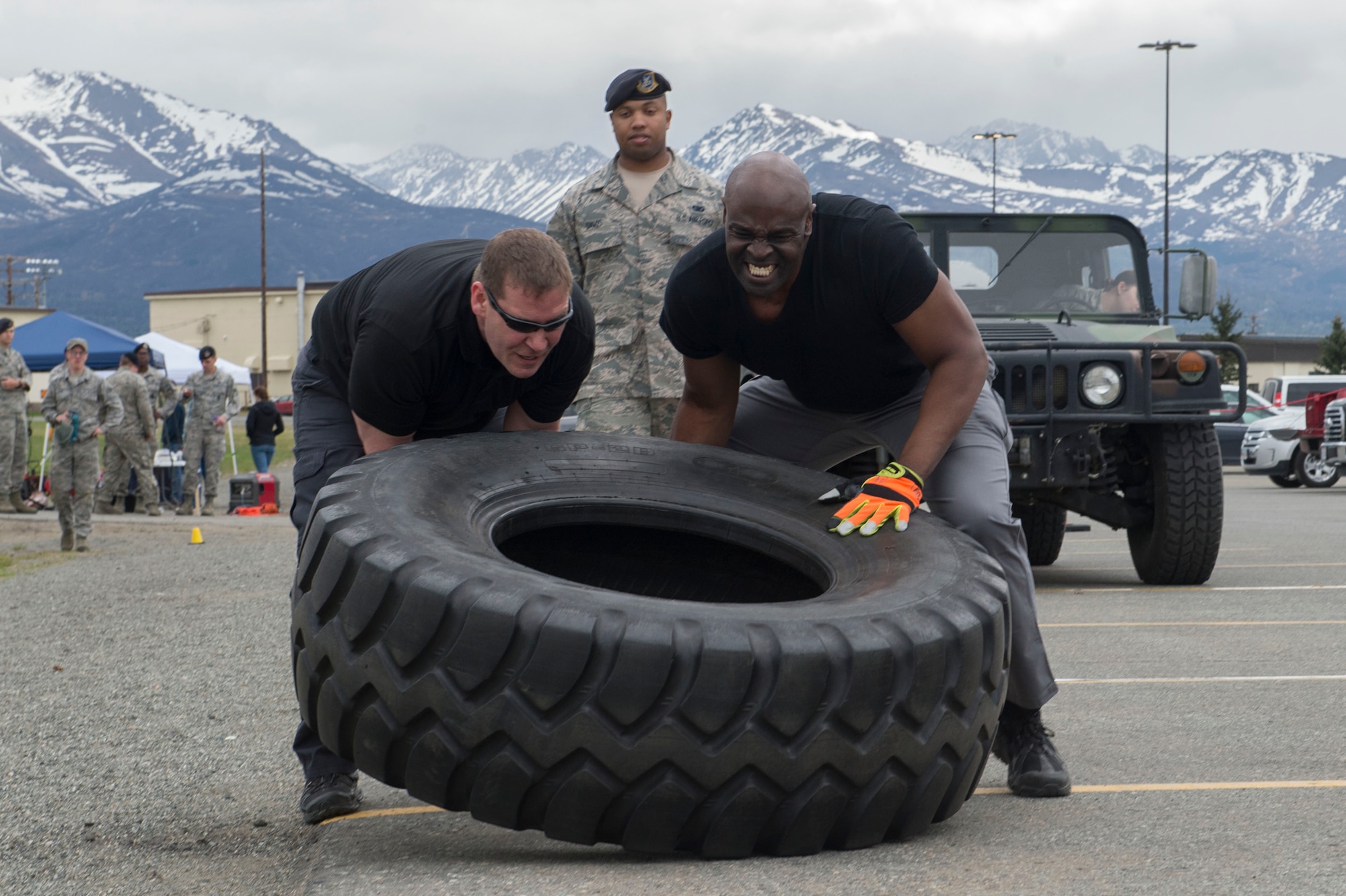Service members and government contract workers compete during Defender Day Challenge on Joint Base Elmendorf-Richardson, Alaska, May 17, 2017. Defender Day is part of police week which focuses on remembrance of those who have made the ultimate sacrifice in the line of duty. 