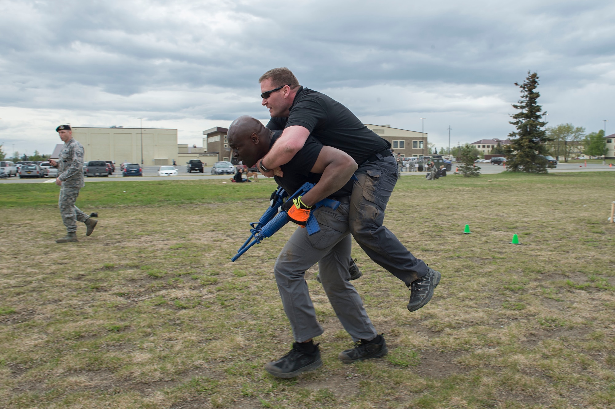 Service members and government contract workers compete during Defender Day Challenge on Joint Base Elmendorf-Richardson, Alaska, May 17, 2017. Defender Day is part of police week which focuses on remembrance of those who have made the ultimate sacrifice in the line of duty. 