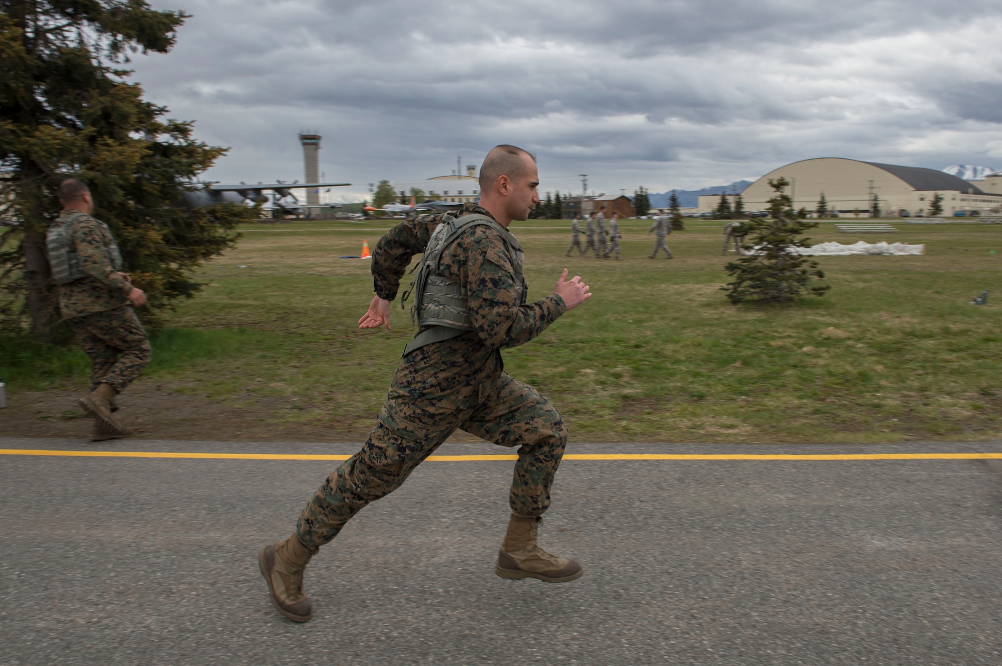 Service members and government contract workers compete during Defender Day Challenge on Joint Base Elmendorf-Richardson, Alaska, May 17, 2017. Defender Day is part of police week which focuses on remembrance of those who have made the ultimate sacrifice in the line of duty. 