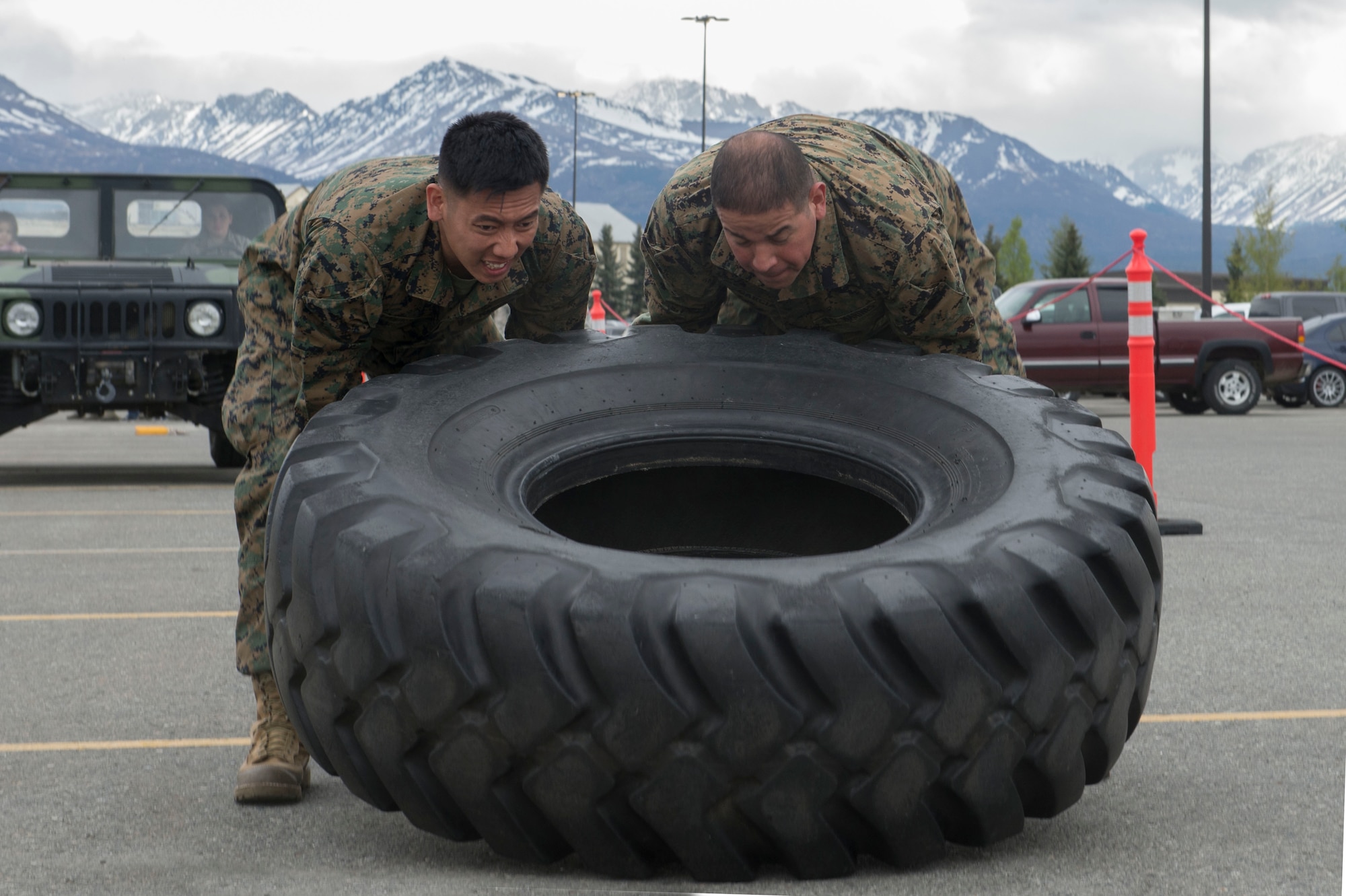 Service members and government contract workers compete during Defender Day Challenge on Joint Base Elmendorf-Richardson, Alaska, May 17, 2017. Defender Day is part of police week which focuses on remembrance of those who have made the ultimate sacrifice in the line of duty. 