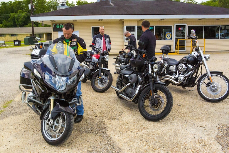 Marines with the Marine Corps Support Facility New Orleans Motorcycle Safety Mentorship Program gather outside Swamp Bar and Grill in Thibodaux, Louisiana, May 17, 2017. The Marine Corps Support Facility New Orleans Motorcycle Safety Mentorship Program, organized the 123 mile ride to help Marines improve their riding skills. (U.S. Marine Corps photo by Pfc. Melany Vasquez / Released)