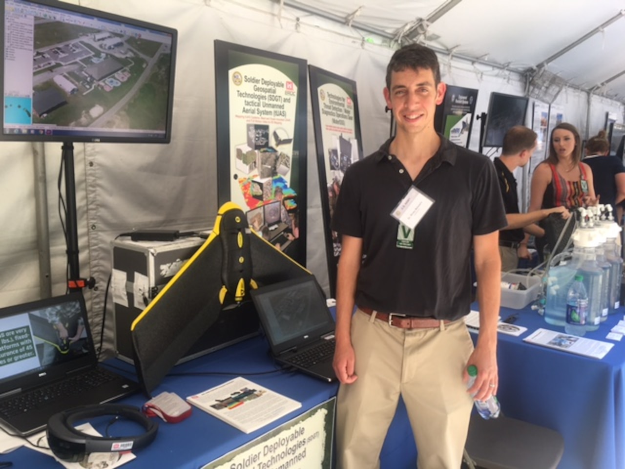 Ricky Massaro, an engineer with the U.S. Army’s Engineer Research and Development Center, stands next to a self-piloting unmanned aerial vehicle during DoD’s Lab Day at the Pentagon, May 18, 2017. Unlike a conventional UAV, this aircraft does not need a human remote-controller. DoD photo by Rick Docksai