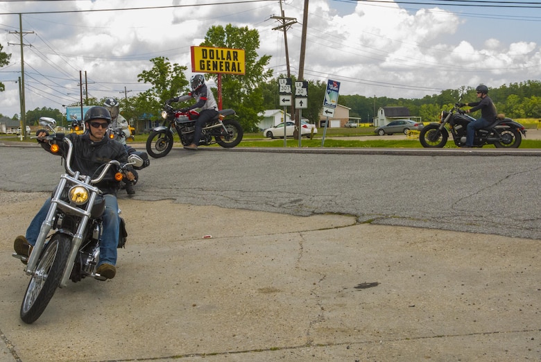 Marines with the Marine Corps Support Facility New Orleans Motorcycle Safety Mentorship Program ride into the parking lot at the Swamp Bar and Grill in Thibodaux, Louisiana, May 17, 2017. The Marine Corps Support Facility New Orleans Motorcycle Safety Mentorship Program, organized the 123 mile ride to teach Marines how to ride their motorcycle through various roads. (U.S. Marine Corps photo by Pfc. Melany Vasquez / Released)