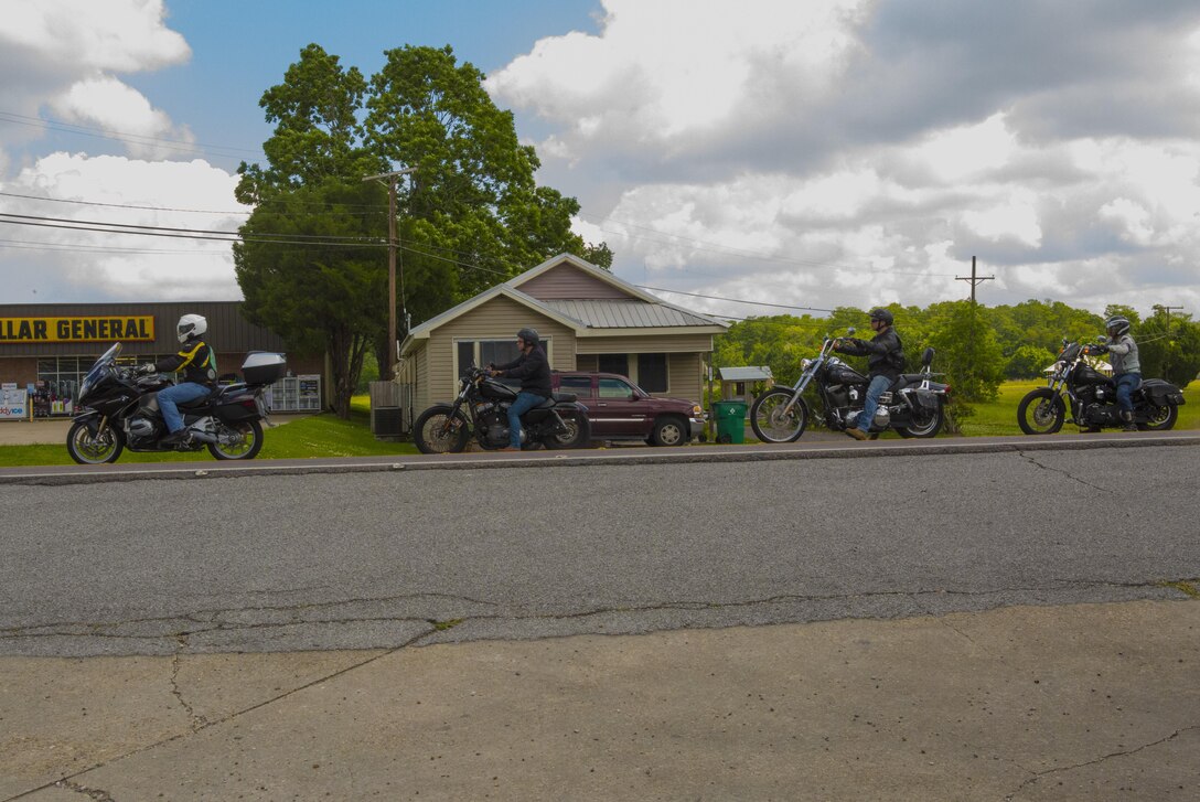 Marines with the Marine Corps Support Facility New Orleans Motorcycle Safety Mentorship Program ride their motorcycles in Thibodaux, Louisiana, May 17, 2017. The Marine Corps Support Facility New Orleans Motorcycle Safety Mentorship Program, organized the 123 mile ride to teach Marines how to ride their motorcycle through various roads. (U.S. Marine Corps photo by Pfc. Melany Vasquez / Released)