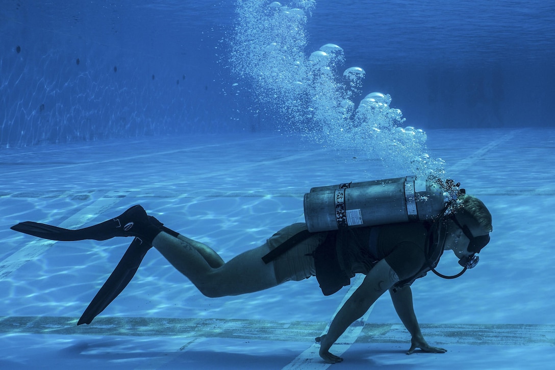 A Marine participates in the U.S. Marine Corps Combatant Diver Course at Camp Schwab in Okinawa, Japan, May 11, 2017. The eight-week course combines lectures, demonstrations and practical application of circuit diving, diving physics and medical aid. The Marine is assigned to the 3rd Reconnaissance Battalion. Marine Corps photo by Sgt. Isaac Ibarra