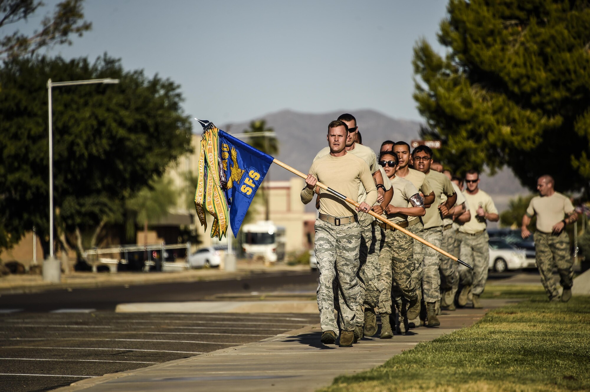 56th Security Forces Squadron Airmen participate in a 24-hour remembrance run during National Police Week May 17, 2017, at Luke Air Force Base, Ariz. Airmen, local police departments and members of the community came together to recognize the service and sacrifice of law enforcement personnel May 15 through May 19. (U.S. Air Force photo by Airman 1st Class Caleb Worpel)