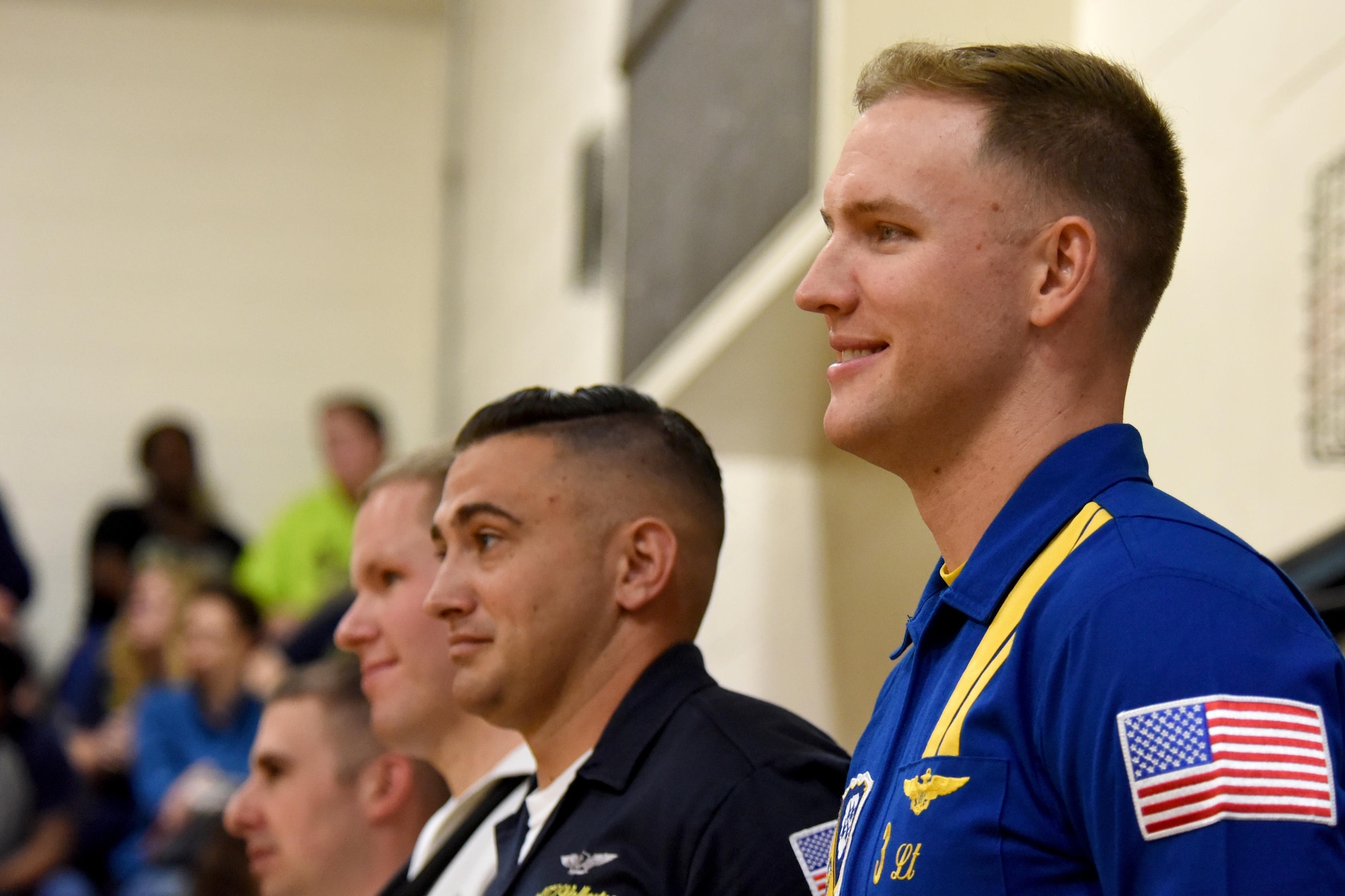 Lt. Nate Scott, U.S. Navy Blue Angels left wing pilot, waits to speak at an assembly, May 19, 2017, at Eastern Wayne High School in Goldsboro, North Carolina. Scott joined the Blue Angels premiere aerial demonstration team in 2016, and has accumulated more than 1600 flight hours. (U.S. Air Force photo by Airman 1st Class Miranda A. Loera)