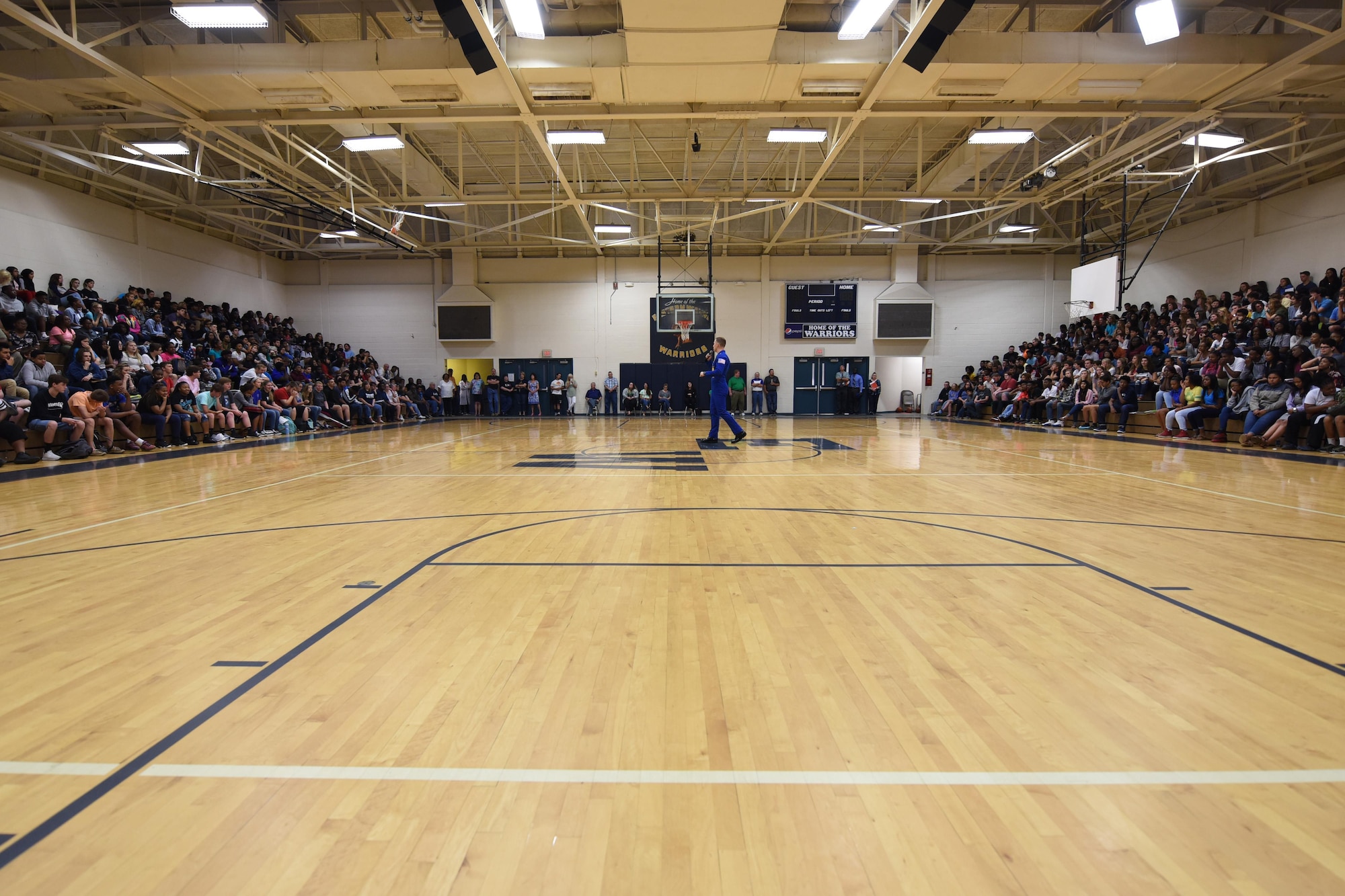 Lt. Nate Scott, U.S. Navy Blue Angels left wing pilot, speaks at an assembly, May 19, 2017, at Eastern Wayne High School in Goldsboro, North Carolina. The Blue Angels will headline the Wings Over Wayne Air Show at Seymour Johnson Air Force Base, North Carolina, May 20-21. (U.S. Air Force photo by Airman 1st Class Miranda A. Loera)