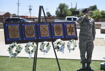 Staff Sgt. Caleb Brooks, 49th Security Forces Squadron, plays taps at the closing ceremony during National Police Week at Holloman Air Force Base, N.M. on May 15, 2017. National Police Week was established in 1962 by President John F. Kennedy to pay tribute to law enforcement officers who lost their lives in the line of duty for the safety and protection of others, according to the National Peace Officer's Memorial Fund website. Ceremonies are held annually in Washington D.C., as well as in communities across the nation. (U.S. Air Force photo by Staff Sgt. Stacy Jonsgaard)    