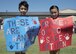 Justin and Keira Carriere display their coming home signs while awaiting their father’s return from a four-month deployment at Dyess Air Force Base, Texas, May 17, 2017. Members of the 39th Airlift Squadron supported efforts of the Special Operations conventional missions in Afghanistan during their deployment. (U.S. Air Force photo by Airman 1st Class Katherine Miller)