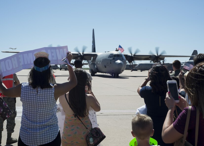 Three C-130J Super Hercules land on the flightline after returning from a deployment to Afghanistan at Dyess Air Force Base, Texas, May 17, 2017. The 39th Airlift Squadron has had a constant presence in Afghanistan since they began operating on a rotating-deployment schedule in 2001. (U.S. Air Force photo by Airman 1st Class Katherine Miller)