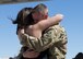 U.S. Air Force Capt. Brian Crawford, 39th Airlift Squadron C-130J Super Hercules pilot, embraces his wife, Brandi, after arriving home from a four-month deployment to Afghanistan at Dyess Air Force Base, Texas, May 17, 2017. While deployed, the 39th AS moved over 8.5 million pounds of cargo and flew over 250 combat sorties. (U.S Air Force photo by Airman 1st Class Katherine Miller)