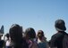 Family and friends of Airmen of the 39th Airlift Squadron anticipate the return of their loved ones at Dyess Air Force Base, Texas, May 17, 2017. The aircrew were deployed to Afghanistan for a four-month deployment rotation and accomplished multiple missions to support their area of responsibility. (U.S. Air Force photo by Airman 1st Class Katherine Miller)