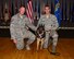 Tech. Sgt. Dustin Weeks, 14th Security Forces Squadron Electronic Security Systems and Resource Advisor, and Senior Airman Kyle Jacob, 1th SFS Military Working Dog Handle, congratulate MWD Rex on his retirement May 17, 2017, at Columbus Air Force Base, Mississippi. Rex spent five years as a drug detection dog and also helped Team BLAZE with MWD demonstrations in the local community. (U.S. Air Force photo by Elizabeth Owens)