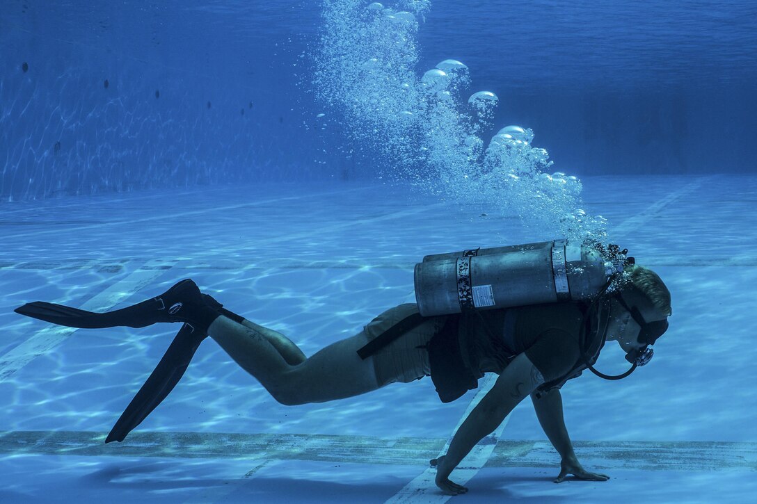 A Marine participates in the U.S. Marine Corps Combatant Diver Course at Camp Schwab in Okinawa, Japan, May 11, 2017. The eight-week course combines lectures, demonstrations and practical application of circuit diving, diving physics and medical aid. The Marine is assigned to the 3rd Reconnaissance Battalion. Marine Corps photo by Sgt. Isaac Ibarra