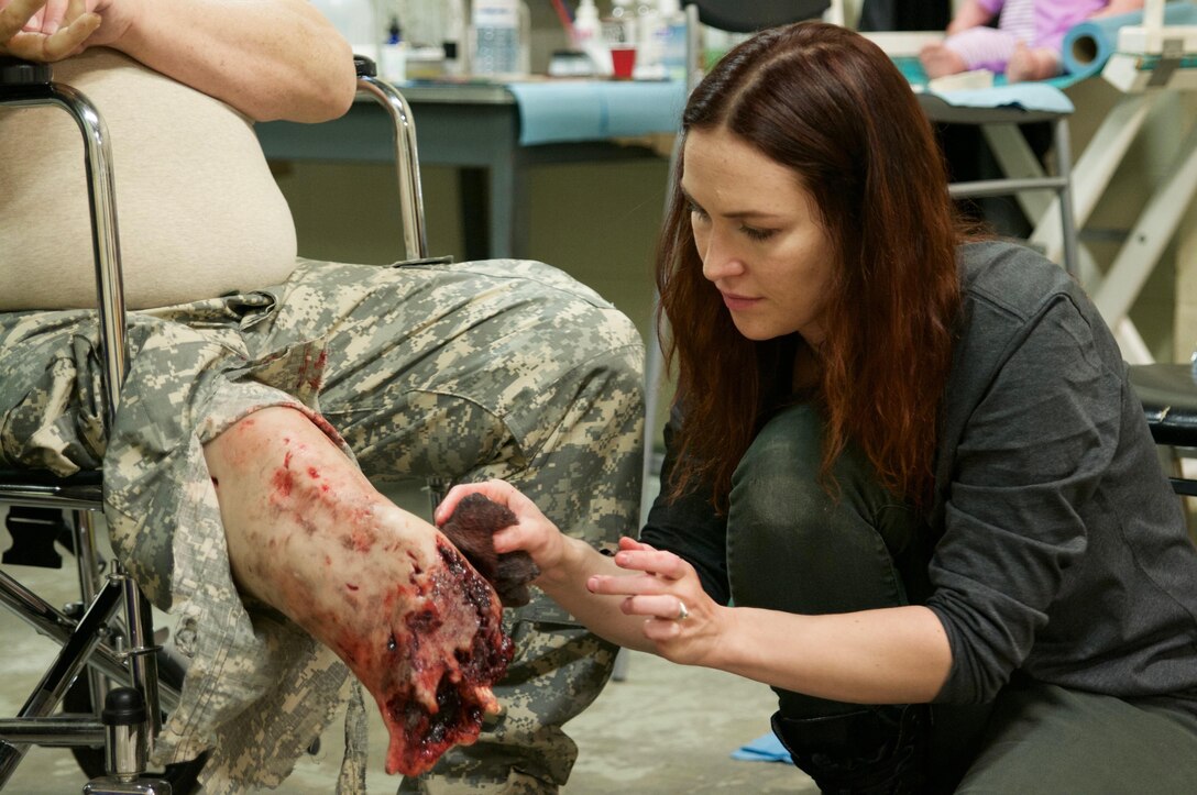 Special effects makeup artist Yvonne Cox applies prosthetic wounds to a role player who will act as a simulated casualty on a training mission as part of Maple Resolve 17, the Canadian Army's premiere brigade-level validation exercise running May 14-29 at Camp Wainwright, Alberta, Canada. The role players play an integral part for the training, allowing the Soldiers to react to life-like, real-time situations ranging from medevac, hostile enemies and media engagements.

As a part of the exercise, the U.S. Army is providing a wide array of combat and support elements. These elements include sustainment, psychological operations, public affairs, aviation and medical units. Readiness is the U.S. Army Reserve's number one priority. Reserve units participating in Maple Resolve 17 will sharpen individual skill sets while enhancing overall unit readiness.