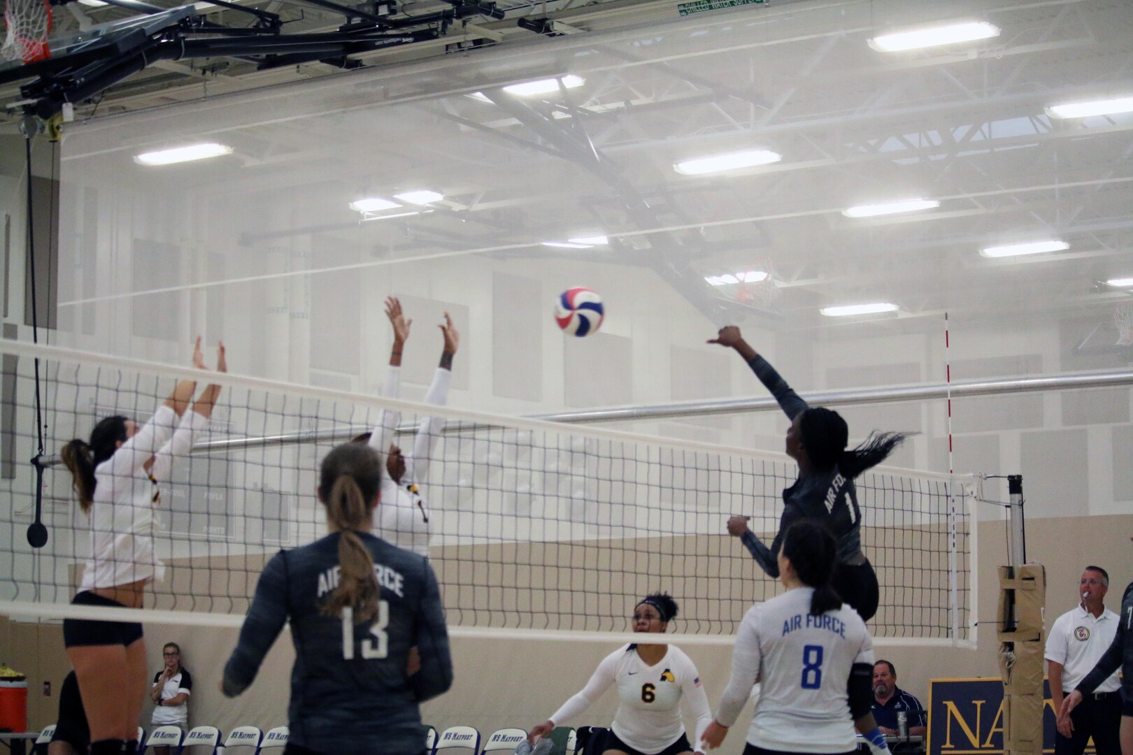 Air Force 2nd lt. Felicia Clement (#1) goes for the kill in Match 4 of the 2017 Armed Forces Women's Volleyball Championship at Naval Station Mayport, Florida on 18 May.