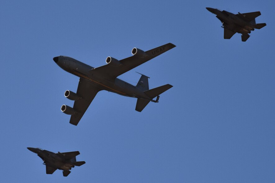 A KC-135 Stratotanker and two F-15E Strike Eagles fly over Seymour Johnson Air Force Base, North Carolina, May 20, 2017, during the Wings Over Wayne Air Show. The flyover demonstrated the two aircraft stationed at Seymour Johnson AFB. (U.S. Air Force photo by Staff Sgt. Brittain Crolley)