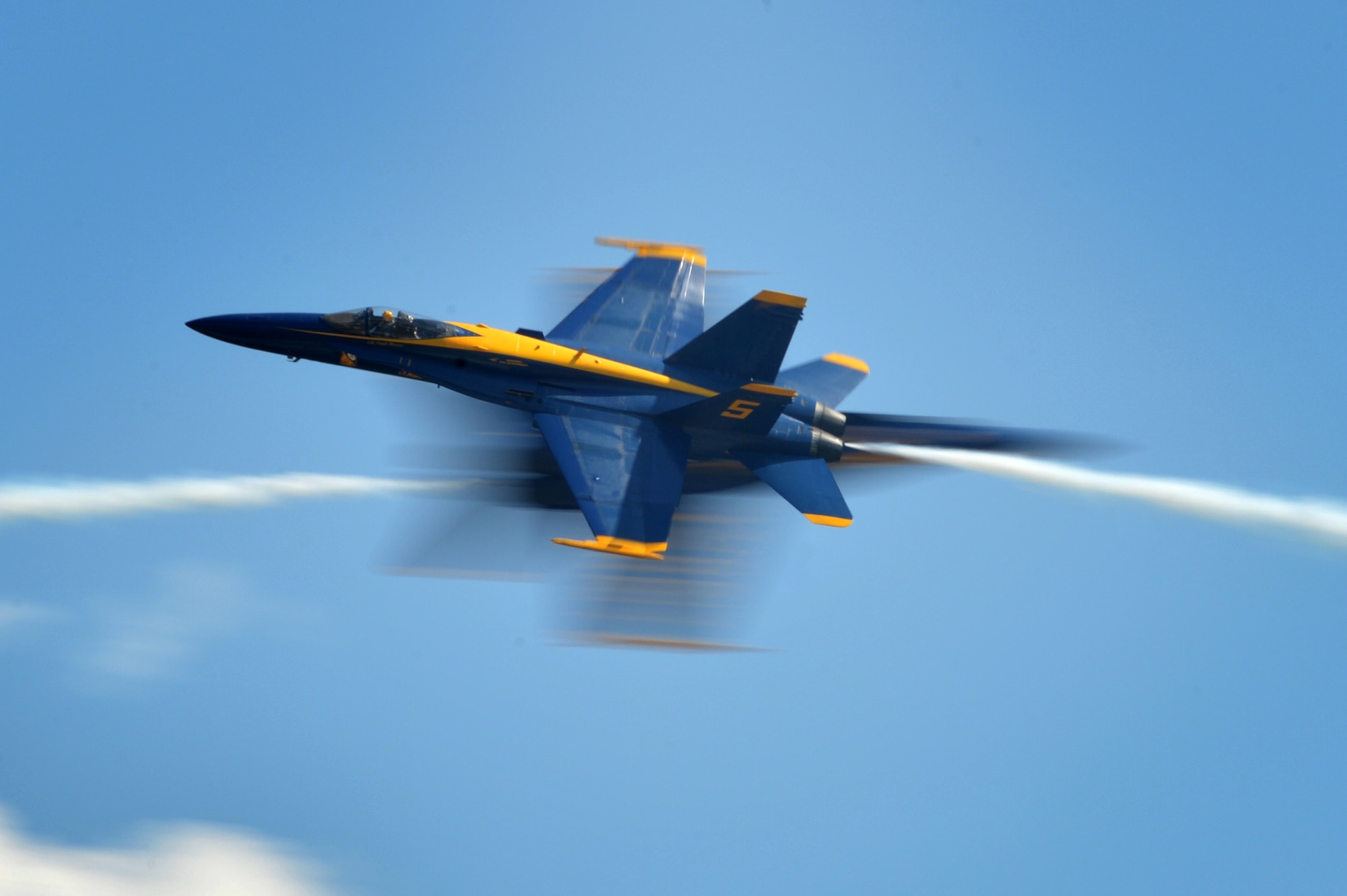 The U.S. Navy Blue Angels perform in the skies over Seymour Johnson Air Force Base, North Carolina, May 20, 2017, during the Wings Over Wayne Air Show. The Blue Angels are the Navy’s premiere aerial demonstration team, led by Commander Ryan J. Bernacchi, the #1 aircraft pilot, flight leader and commanding officer of the 2017 team. (U.S. Air Force photo by Airman 1st Class Christopher Maldonado)