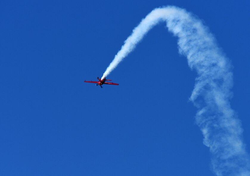 Jacquie Warda performs aerial demonstrations in her Extra 300 monoplane during the Wings Over Wayne Air Show, May 20, 2017, at Seymour Johnson Air Force Base, North Carolina. The air show is held during odd-numbered years and features multiple ground and air demonstrations to the public. (U.S. Air Force photo by Rank Airman 1st Class Miranda A. Loera)