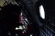 A member of the Black Daggers, the official U.S. Army Special Operations Command Parachute Demonstration Team, prepares to jump from an aircraft during the Wings Over Wayne Air Show, May 20, 2017, in the skies over Seymour Johnson Air Force Base, North Carolina. The Black Daggers perform live aerial demonstrations in support of Army Special Operations community relations and recruiting. (U.S. Air Force photo by Airman 1st Class Kenneth Boyton)