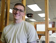 U.S. Air Force Airman 1st Class Kaden Petersen, 18th Civil Engineer Squadron structural apprentice, assisted a local family injured in a car accident April 2, 2017, in Okinawa, Japan. Petersen provided medical care to one of two children until an ambulance arrived to take them to a hospital. (U.S. Air Force photo by Senior Airman Lynette M. Rolen)