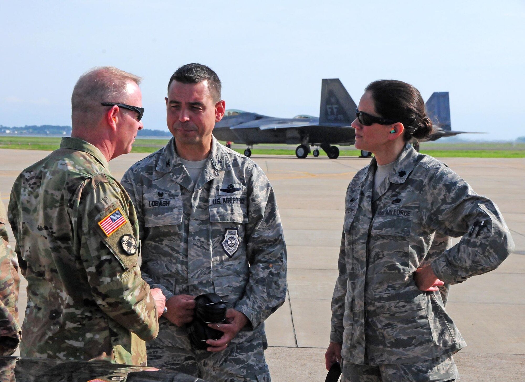 Maj. Gen. Timothy P. Williams, the Adjutant General of Virginia met with members from the 192nd Fighter Wing Maintenance Group at Joint Base Langley-Eustis, Virginia April 22, 2017. During his visit, Williams viewed the launch of an F-22 Raptor, observed a weapons load training event, listened to concerns and ideas from both Maintenance and Aircraft Maintenance Squadron Airmen, was briefed on current and future operations, and took the opportunity to recognize several Airmen for their accomplishments here by coining them. (U.S. Air National Guard photo by Staff Sgt. Johnisa B. Roberts)