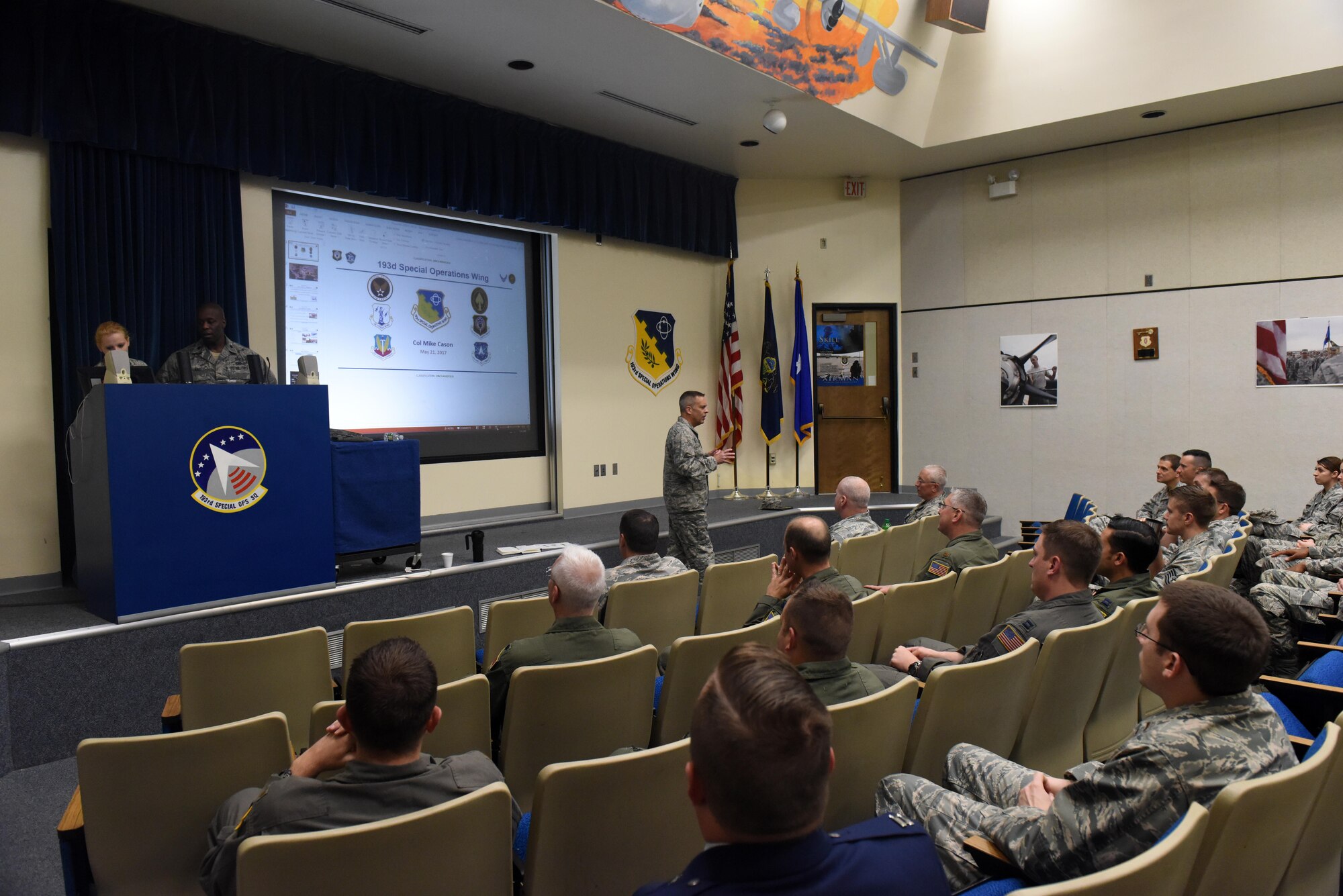 Col. Mike Cason, 193rd Special Operations Wing commander, addresses the members of the wing during a "town hall" meeting May 20. Cason discussed many things, to include the wing’s mission statement, his priorities and challenges the wing is currently facing. (U.S. Air National Guard photo by Senior Airman Julia Sorber/Released)