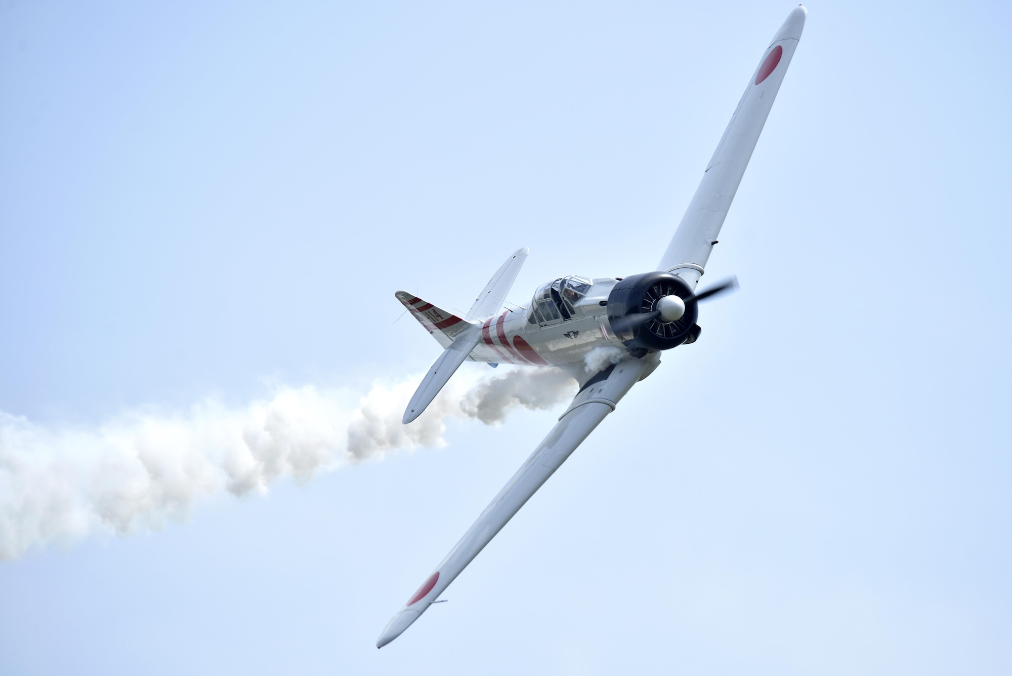 A Japanese Mitsubishi A6M Zero aircraft performs as part of the "Tora! Tora! Tora!" performance during the Wings Over Wayne Air Show, May 21, 2017, at Seymour Johnson Air Force Base, North Carolina. The installation is open to the public for two, free, daylong air and ground demonstration performances. (U.S. Air Force photo by Airman 1st Class Christopher Maldonado)
