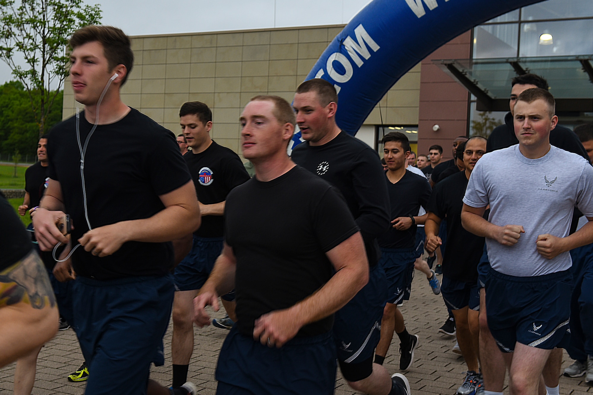 U.S. Airmen assigned to Spangdahlem Air Base, Germany begin a National Police Week memorial 5K run here May 19, 2017. NPW was established in 1962 by President John F. Kennedy, to honor the bravery and sacrifices of the men and women who serve as police officers. (U.S. Air Force photo by Senior Airman Dawn M. Weber)
