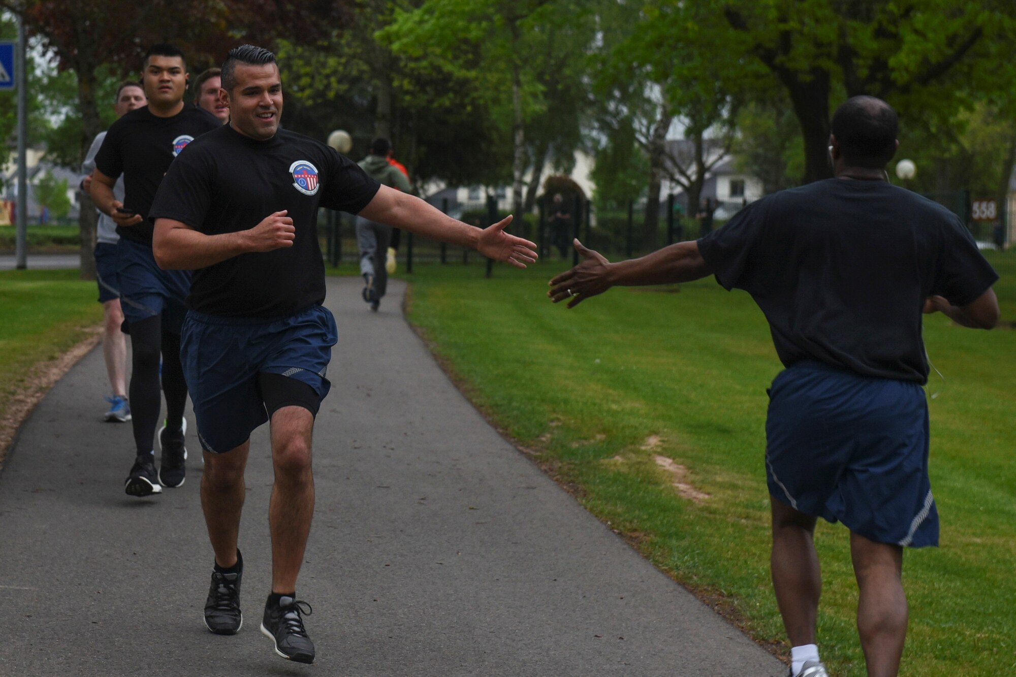 U.S. Tech. Sgt. Louis Almaguer, 52nd Civil Engineer Squadron NCO in charge of execution support and TSgt. Bruce Holden, 52nd CES NCOIC of service contracts, during a National Police Week memorial 5K run at Spangdahlem Air Base, Germany, May 19, 2017. The run was the last event during National Police Week held at the base to honor the bravery and sacrifices of the men and women who serve as police officers. (U.S. Air Force photo by Senior Airman Dawn M. Weber)