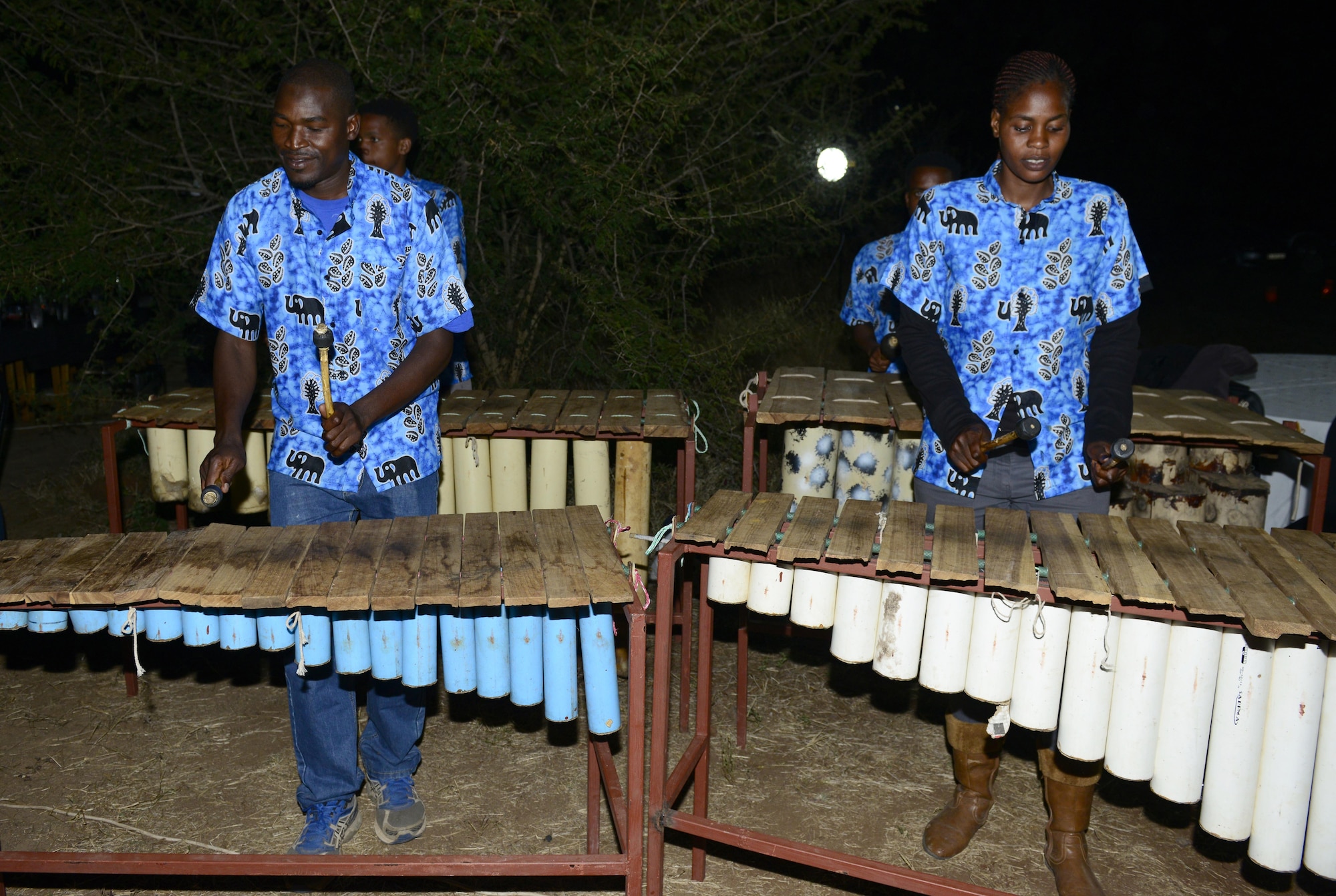 Musicians play during the closing ceremony of the 2017 African Air Chiefs Symposium in Kasane, Botswana on May 17, 2017. The closing ceremony was held in conjunction with a cultural dinner organized by the symposium’s co-host, Botswana. The dinner consisted of dancers, music from a local band, and food that reflects the culture of Botswana. (U.S. Air Force photo by Staff Sgt. Krystal Ardrey)