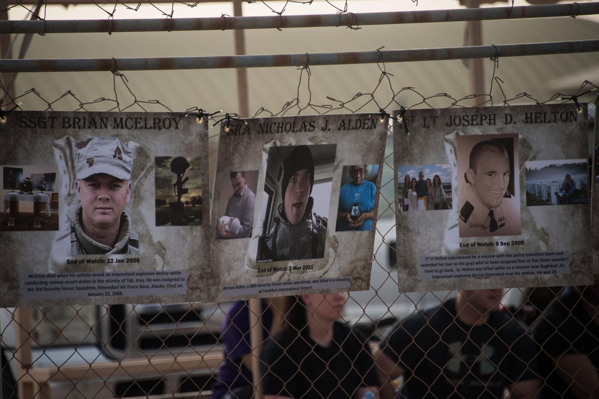 The 386th and 387th Expeditionary Security Forces Squadrons displayed signs honoring the Fourteen security forces members lost during Operations Iraqi Freedom, Enduring Freedom, Freedom's Sentinel and Inherent Resolve during a homerun derby at an undisclosed location in Southwest Asia, May 17, 2017. In remembrance of each individual who gave their lives for their country, their state and their community, members of the 386th, 387th and coalition forces worked together throughout the week to pay their respects to fallen law enforcement officers. (U.S. Air Force photo/TSgt Jonathan Hehnly)