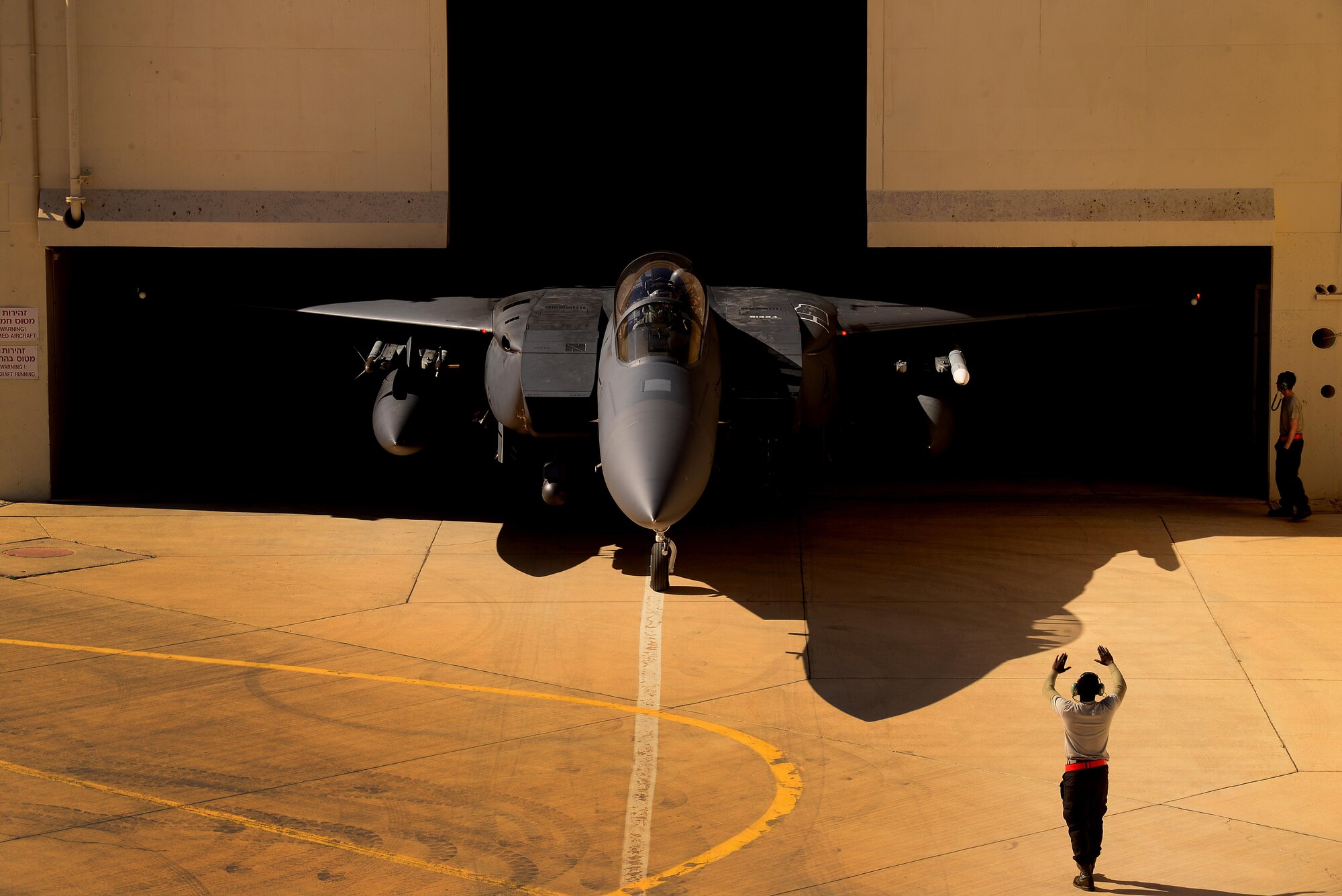 An F-15E Strike Eagle assigned to the 494th Fighter Squadron, Royal Air Force Lakenheath, England, emerges from a protective aircraft shelter in support of exercise Juniper Falcon May 8, at Uvda Air Base, Israel. Juniper Falcon 17 represents the combination of several bi-lateral component/ Israeli Defense Force exercises that have been executed annually since 2011. These exercises were combined to increase joint training opportunities and capitalize on transportation and cost efficiencies gained by aggregating forces.  (U.S. Air Force photo/ Tech. Sgt. Matthew Plew)