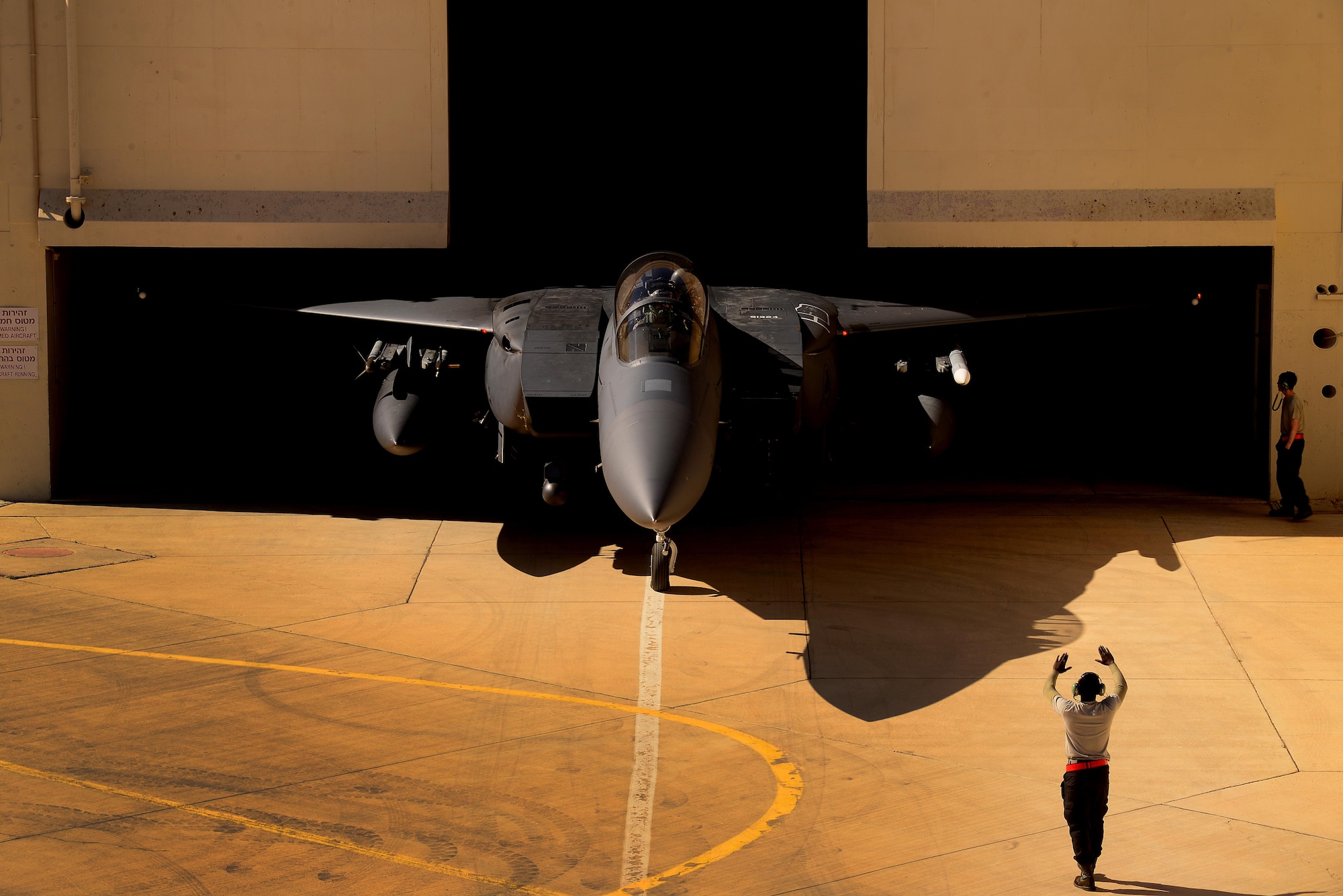 An F-15E Strike Eagle assigned to the 494th Fighter Squadron, Royal Air Force Lakenheath, England, emerges from a protective aircraft shelter in support of exercise Juniper Falcon May 8, at Uvda Air Base, Israel. Juniper Falcon 17 represents the combination of several bi-lateral component/ Israeli Defense Force exercises that have been executed annually since 2011. These exercises were combined to increase joint training opportunities and capitalize on transportation and cost efficiencies gained by aggregating forces.  (U.S. Air Force photo/ Tech. Sgt. Matthew Plew)