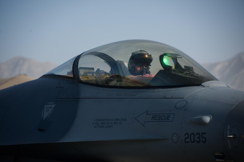 Lt. Col. Vince O’Connor, the commander of the 555th Expeditionary Fighter Squadron, waits inside an F-16 Fighting Falcon after landing on Bagram Airfield, Afghanistan, May 19, 2017. Over his career, O’Connor has accumulated more than 2,000 flying hours, which amounts to 2.5 months of flying. (U.S. Air Force photo by Staff Sgt. Benjamin Gonsier)