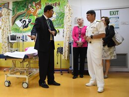 George Cheriyan, chief medical officer and CEO of the American Mission Hospital, shows Commander of U.S. Naval Forces Central Command Vice Adm. Kevin Donegan a pediatric ward during a tour of the hospital. The tour underscores the longest and most enduring relationship between the United States and Bahrain. The American Mission Hospital has served the people of Bahrain for more than 100 years. Bahrain is headquarters to the U.S. 5th Fleet. (U.S. Navy photo by Mass Communication Specialist 2nd Class Victoria Kinney) 
