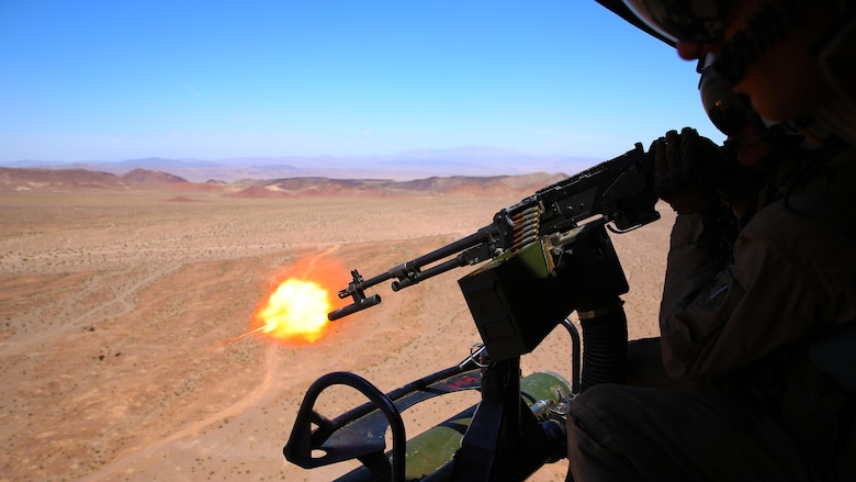 TLance Cpl. Gregory Ybarra, a UH-1Y crew chief with Marine Light Attack Helicopter Squadron (HMLA) 469, provides cover fire for Marines from 3rd Marine Regiment during a tactical recovery of aircraft and personnel (TRAP) training mission as part of Integrated Training Exercise (ITX) 3-17 at Marine Air Ground Combat Center Twentynine Palms, Calif., May 17. ITX is a combined-arms training exercise enabling Marines across 3rd Marine Aircraft Wing to operate as an aviation combat element integrated with ground and logistics combat elements as a Marine air-ground task force. More than 650 Marines and 27 aircraft with 3rd MAW are supporting ITX 3-17. 