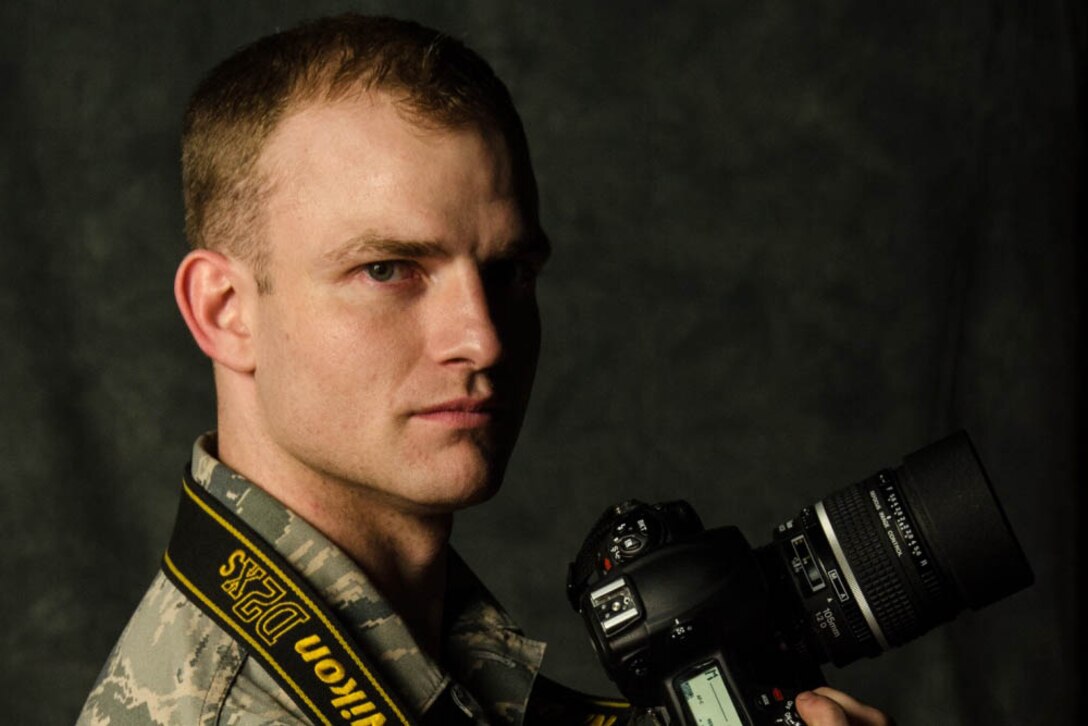 Air Force Staff Sgt. Colton Elliott has faced much adversity throughout his life and now he’s found a home with the Air National Guard. Elliott, a photojournalist with the Missouri Air National Guard’s 131st Bomb Wing, poses for a photo at Whiteman Air Force Base, Mo., April 2, 2017. Air Force photo by Airman 1st Class Halley Burgess