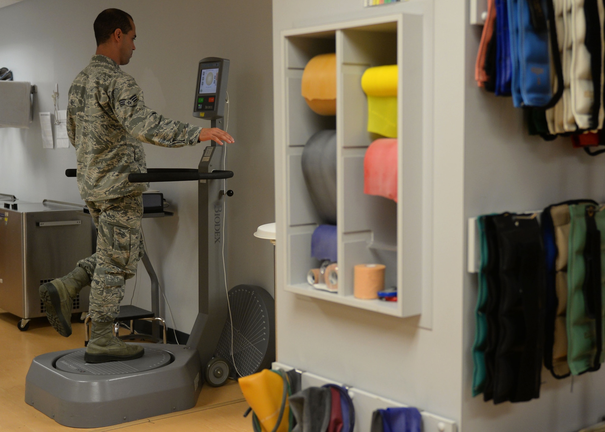 Senior Airman Hessen Martinez Cruz, 19th Medical Operations Squadron physical therapy technician, demonstrates one of the many machines the clinic offers to help rehabilitate Airmen May 2, 2017 at the physical therapy clinic on Little Rock Air Force Base, Arkansas. From identifying problems to developing and implementing a care plan, physical therapy specialists like Martinez-Cruz work with patients as long as necessary so they can resume healthy, active lifestyles. (U.S. Air Force photo by Airman 1st Class Codie Collins)