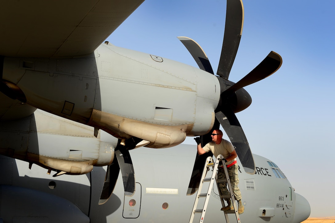 An Airman assigned to the 86th Aircraft Maintenance Squadron, 86th Airlift Wing, Ramstein Air Base, Germany, conducts a visual inspection of a C-130J Super Hercules engine prior to a sortie in support of exercise Juniper Falcon May 14, at Nevatim Air Force Base, Israel. Juniper Falcon 17 represents the combination of several bi-lateral component exercises with Israel Defense Forces that have been executed annually since 2011. These exercises were combined to increase joint training opportunities and capitalize on transportation and cost efficiencies gained by aggregating forces. (U.S. Air Force photo/ Tech. Sgt. Matthew Plew)
