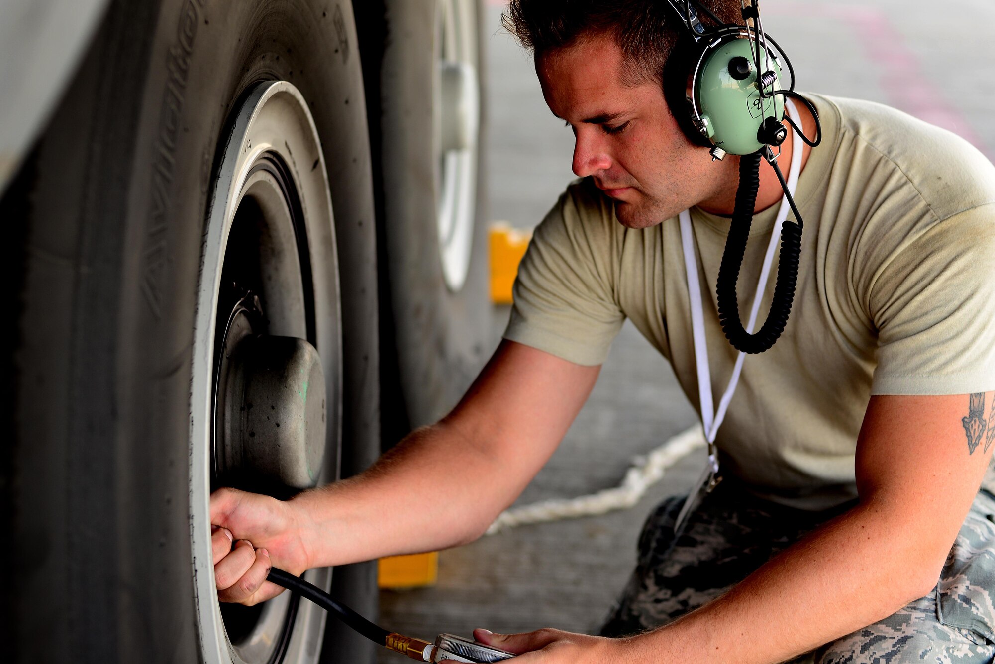 An Airman assigned to the 86th Aircraft Maintenance Squadron, 86th Airlift Wing, Ramstein Air Base, Germany, checks the tire pressure of a C-130J Super Hercules prior to a sortie in support of exercise Juniper Falcon May 14, at Nevatim Air Force Base, Israel. Juniper Falcon 17 represents the combination of several bi-lateral component exercises with Israel Defense Forces that have been executed annually since 2011. These exercises were combined to increase joint training opportunities and capitalize on transportation and cost efficiencies gained by aggregating forces. (U.S. Air Force photo/ Tech. Sgt. Matthew Plew)