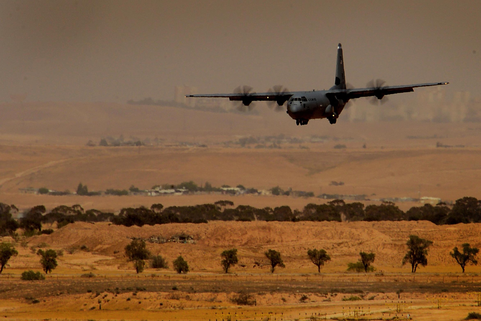 A C-130J Super Hercules assigned to the 37th Airlift Squadron, 86th Airlift Wing, Ramstein Air Base, Germany, makes a low-level approach during a sortie in support of exercise Juniper Falcon May 14, at Nevatim Air Force Base, Israel. Juniper Falcon 17 represents the combination of several several bi-lateral component exercises with Israel Defense Forces that have been executed annually since 2011. These exercises were combined to increase joint training opportunities and capitalize on transportation and cost efficiencies gained by aggregating forces.(U.S. Air Force photo/ Tech. Sgt. Matthew Plew)