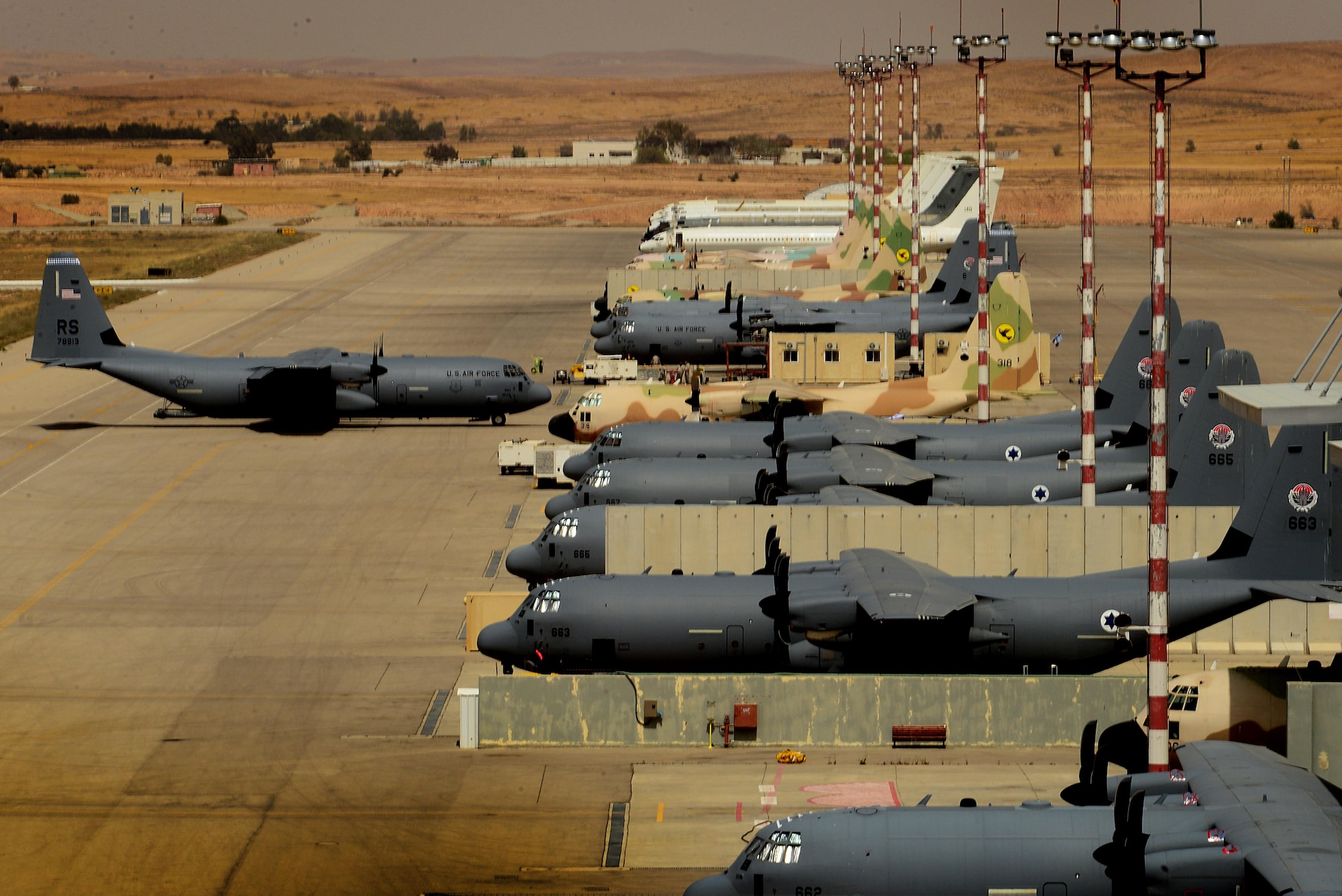 A C-130J Super Hercules assigned to the 37th Airlift Squadron, 86th Airlift Wing, Ramstein Air Base, Germany, taxis to park after completion of a sortie in support of exercise Juniper Falcon May 14, at Nevatim Air Force Base, Israel. Juniper Falcon 17 represents the combination of several bi-lateral component exercises with Israel Defense Forces that have been executed annually since 2011. These exercises were combined to increase joint training opportunities and capitalize on transportation and cost efficiencies gained by aggregating forces. (U.S. Air Force photo/ Tech. Sgt. Matthew Plew)