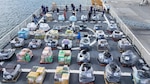 Media members get video of contraband during a drug offload press event in Port Everglades, Fla., May 18, 2017. Joint operations lead to the interdiction of over 18.5 tons of contraband. (Photo by Petty Officer 1st Class Luke Clayton)