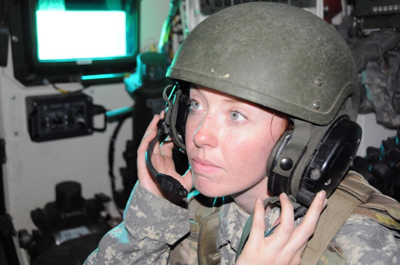 Spc. Allison Clevenger, a chemical, biological, radiological and nuclear specialist with the U.S. Army Reserve’s 300th Chemical Company from Morgantown, West Virginia, watches a monitor in the back of a Stryker M1135 Nuclear, Biological and Chemical Reconnaissance Vehicle May 19 during .50 caliber live-fire qualifications at Joint Base McGuire-Dix-Lakehurst, New Jersey.  Clevenger serves as the crew’s assistant surveyor.