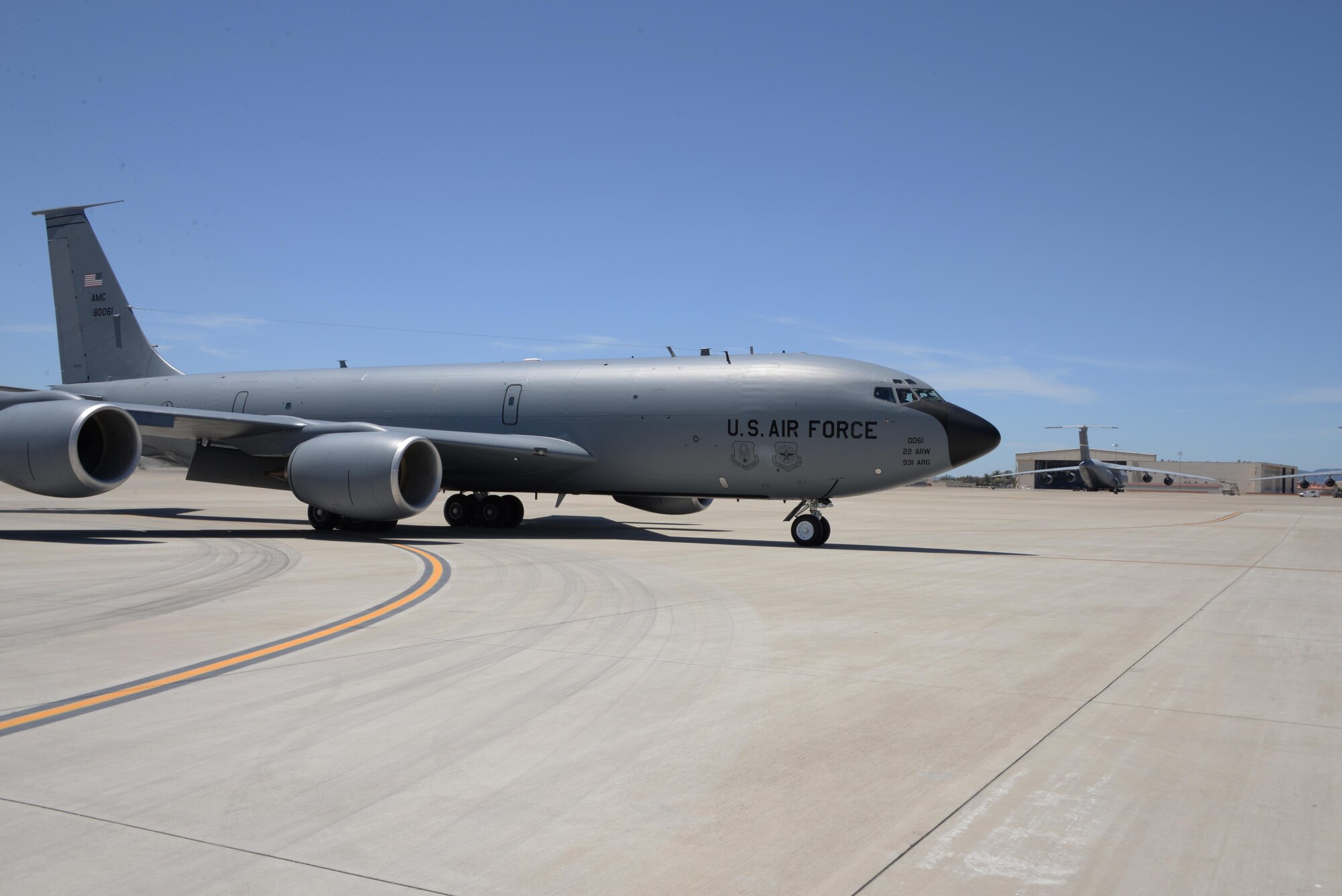A KC-135 Stratotanker assigned to the 22nd Air Refueling Wing at McConnell Air Force Base, Kan., taxis to its parking spot May 18, 2017 at Travis AFB, Calif. The KC-135 was part of a group of eight aircraft that flew to Travis to avoid extreme weather in the Midwest. (U.S. Air Force photo/Tech. Sgt. James Hodgman)