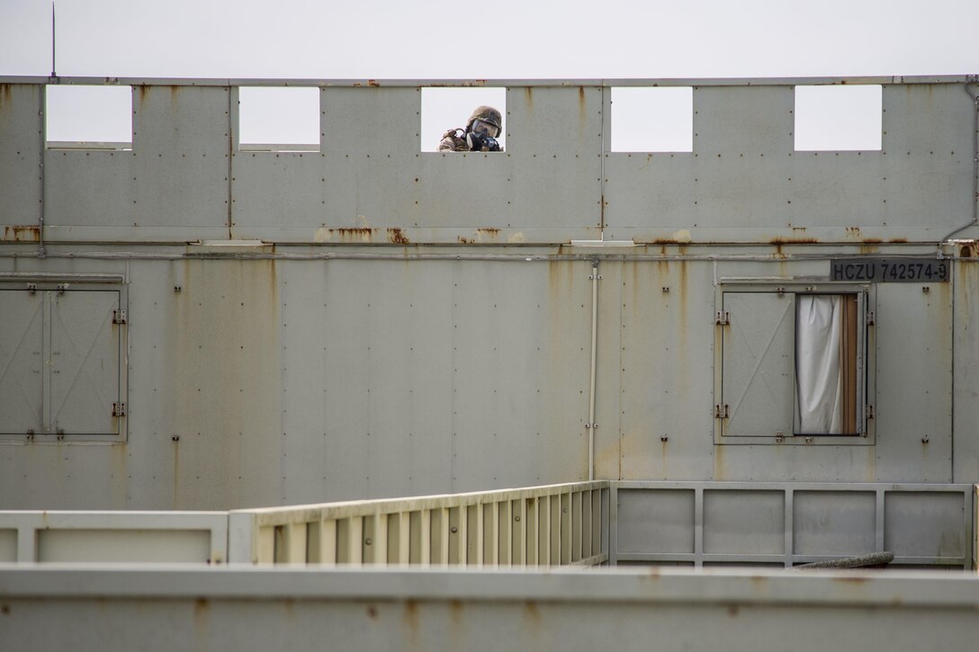 U.S. Marines with 3D Marine Logistics Group, III Marine Expeditionary Force, conduct Military Operation Urban Terrain drills on Camp Hansen, Okinawa, Japan, May 11, 2017. The U.S. Army Engineering and Support Center, Huntsville is the designated the Range and Training Land Program Mandatory Center of Expertise and assists the Department of the Army and installations in planning, site development, programming and design of ranges.