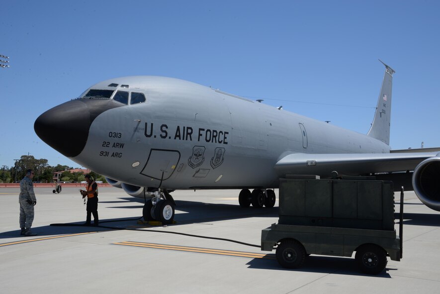 A KC-135 Stratotanker assigned to the 22nd Air Refueling Wing at McConnell Air Force Base, Kan., waits to be serviced May 18, 2017 at Travis AFB, Calif. The KC-135 was part of a group of eight aircraft that flew to Travis to avoid extreme weather in the Midwest. (U.S. Air Force photo/Tech. Sgt. James Hodgman)