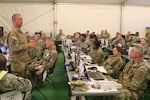 Brig. Gen. David O. Smith, the commander of the 184th Sustainment Command, speaks during his update brief at the National Training Center at Fort Irwin May 20, 2017. The NTC rotation allows the 155th, 184th, and supporting units to build teamwork and maintain combat readiness for future missions. 